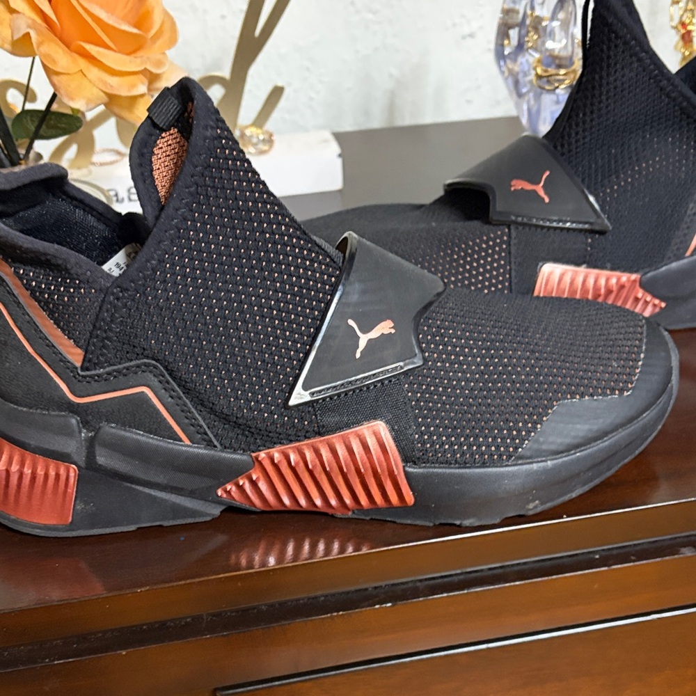 Puma women Black and Orange Sneakers